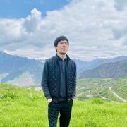  ,  Komron, 32