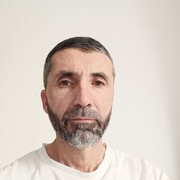  ,  Komil, 57