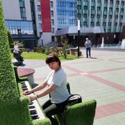   ,  Elena, 44