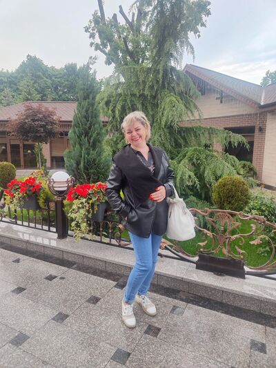  ,   Larisa, 51 ,   